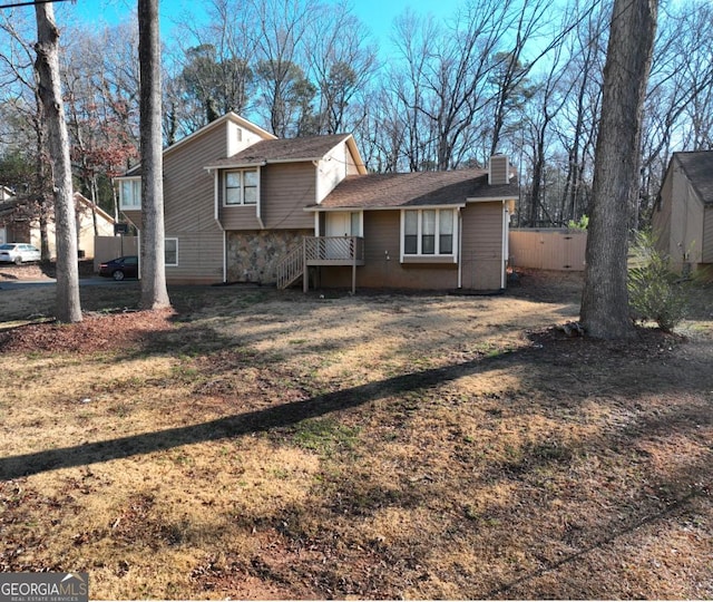 view of front of property with a front lawn