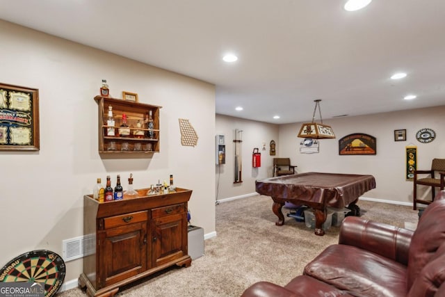 game room with billiards, bar area, and light colored carpet