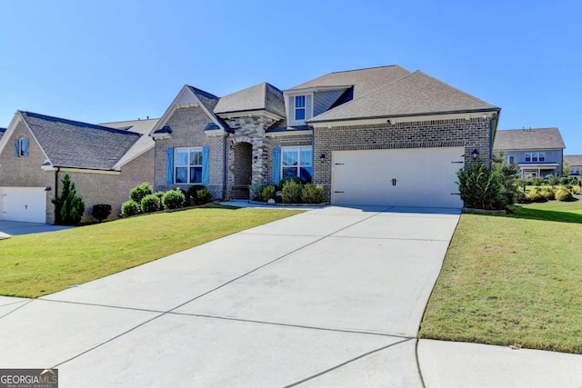 view of front of house with a front lawn and a garage