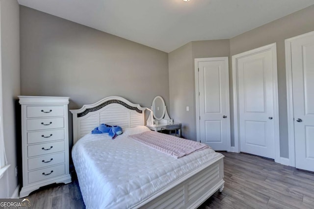 bedroom featuring hardwood / wood-style flooring