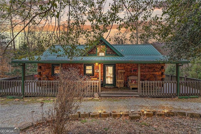 view of front of home with a wooden deck