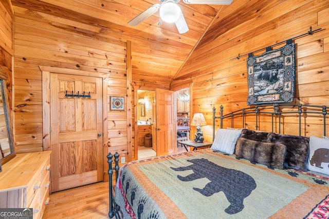 bedroom with wooden ceiling, ceiling fan, wooden walls, light hardwood / wood-style flooring, and lofted ceiling