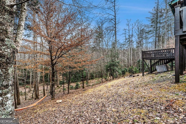 view of yard with a deck