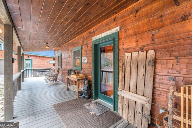 wooden deck featuring a porch