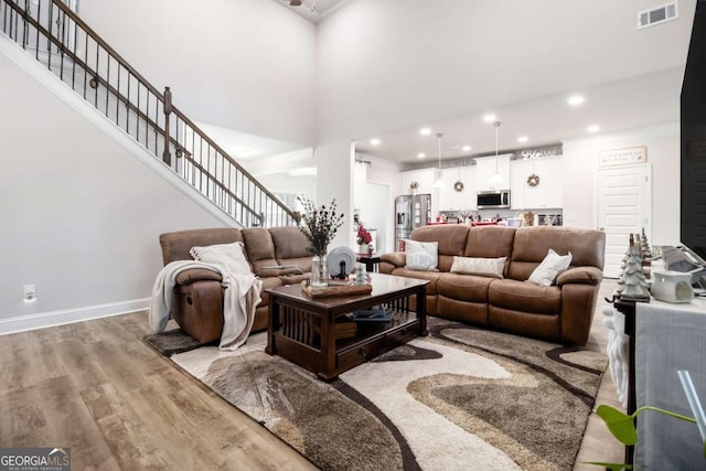 living room with wood-type flooring