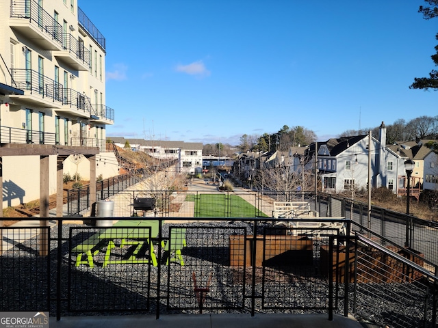 balcony featuring area for grilling