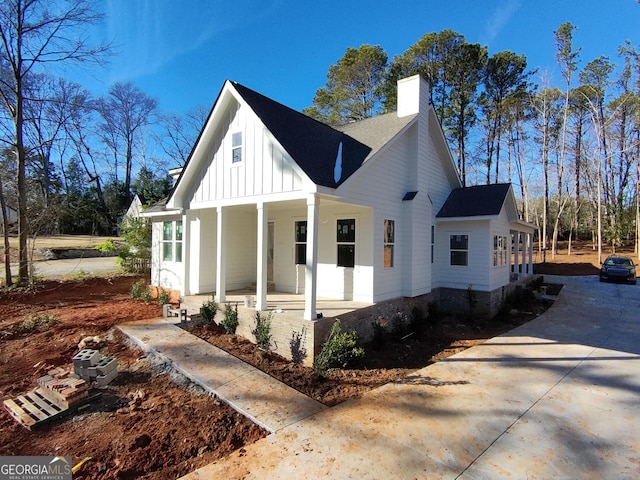 view of home's exterior featuring covered porch