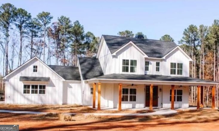 modern farmhouse with a porch