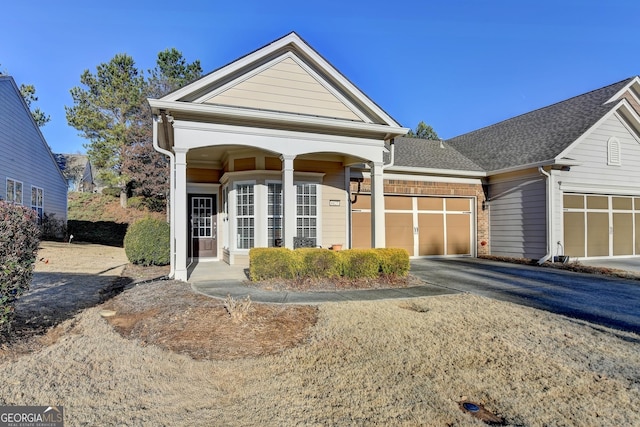 view of front of property featuring a garage