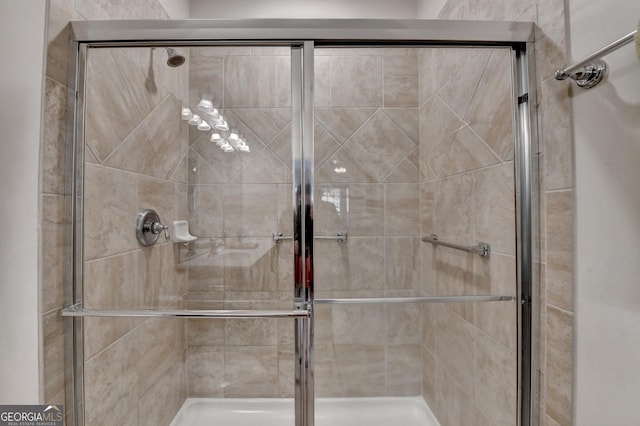 bathroom with an enclosed shower