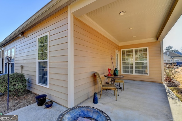 view of patio / terrace featuring a fire pit