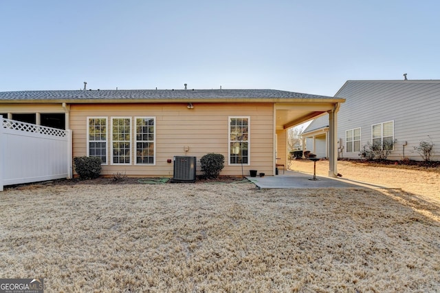 back of property with a patio and central air condition unit