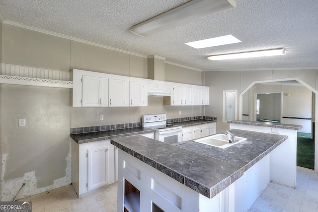 kitchen featuring a textured ceiling, a kitchen island, white cabinets, white electric range, and sink