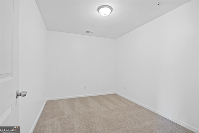 empty room featuring carpet flooring