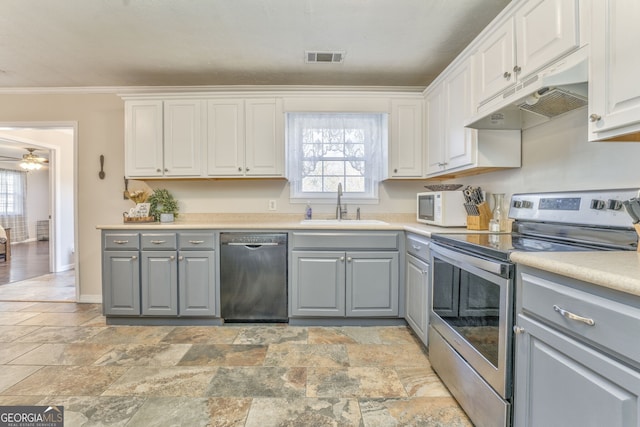 kitchen with dishwasher, stainless steel electric range, white cabinets, and sink