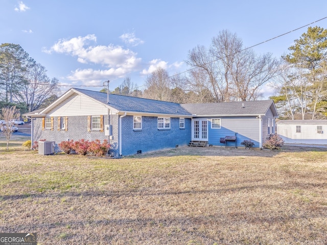 single story home featuring central AC, french doors, and a front lawn