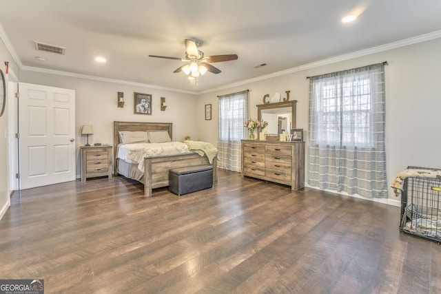 bedroom featuring ornamental molding, ceiling fan, and dark hardwood / wood-style floors