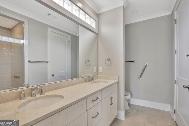 bathroom featuring vanity, a shower, tile patterned floors, and toilet