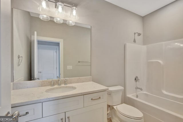 full bathroom featuring toilet, bathtub / shower combination, and vanity