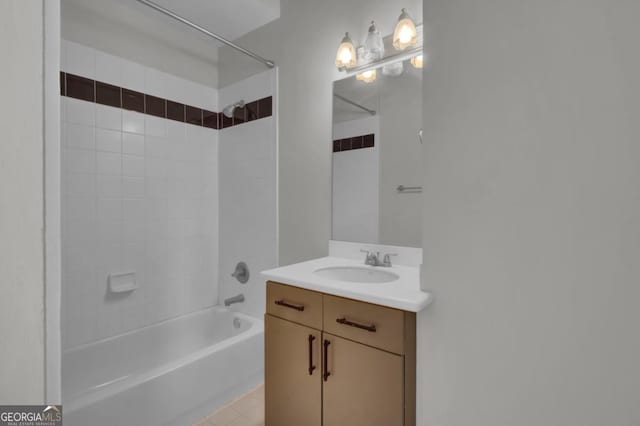 bathroom with vanity and tiled shower / bath combo