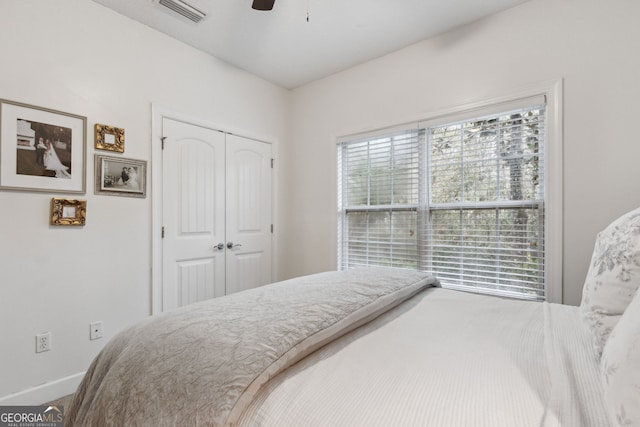 bedroom with a closet and ceiling fan