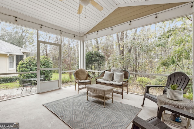 sunroom / solarium with ceiling fan