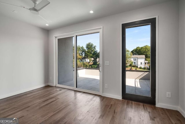 entryway with ceiling fan and dark hardwood / wood-style floors