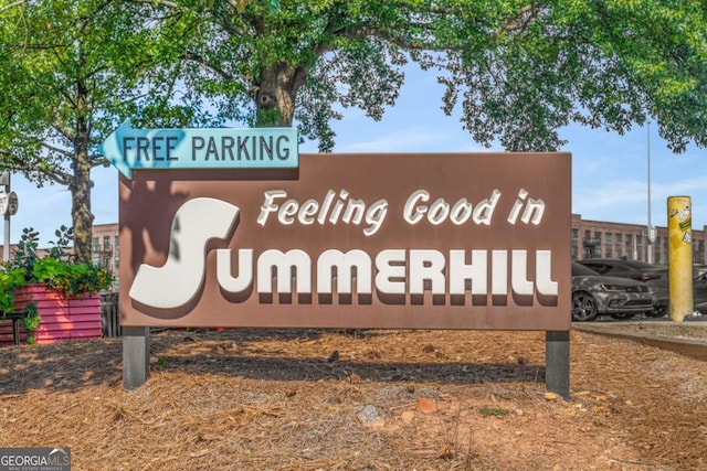 view of community sign