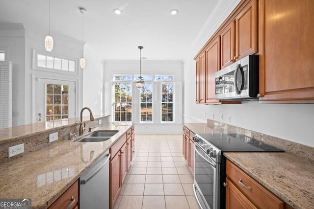 22 Lazy Hammock Ct, Savannah, GA 31419 - kitchen featuring stainless steel appliances, ornamental molding, light stone counters, sink, and decorative light fixtures