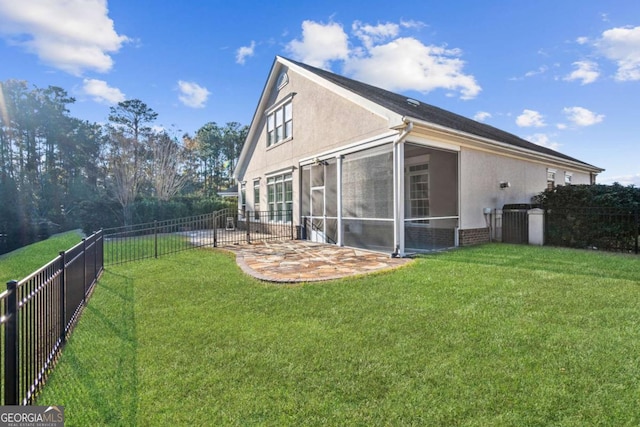 22 Lazy Hammock Ct, Savannah, GA 31419 - back of house with a patio, a yard, and a sunroom