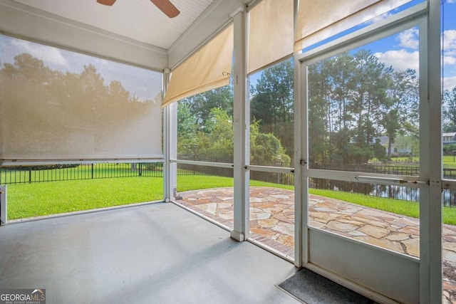 22 Lazy Hammock Ct, Savannah, GA 31419 - unfurnished sunroom with ceiling fan and a water view