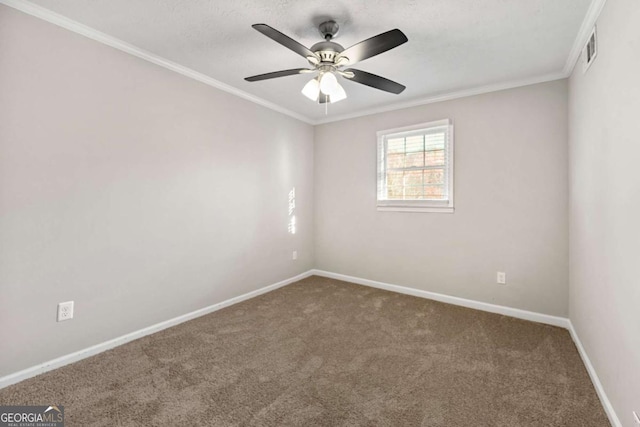 carpeted empty room with ceiling fan and ornamental molding