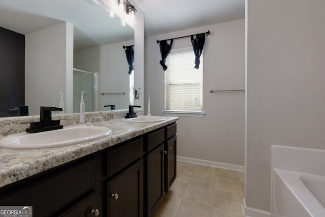 bathroom featuring a tub and vanity