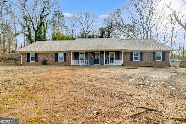 single story home with covered porch