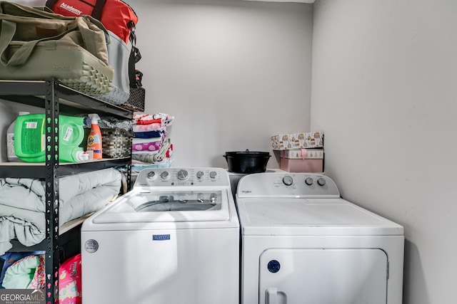 laundry room with washer and dryer