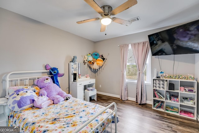 bedroom featuring ceiling fan and wood-type flooring