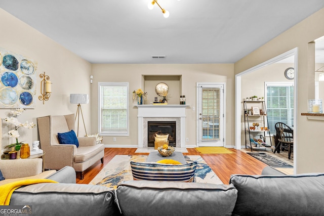 living room featuring hardwood / wood-style floors and plenty of natural light