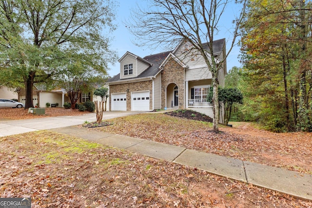 view of front of home with a garage