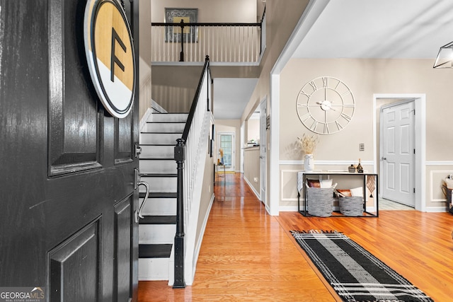 foyer entrance featuring hardwood / wood-style floors