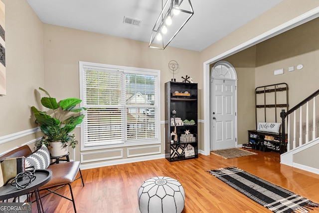 living area with wood-type flooring