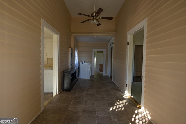 hall with washer / clothes dryer