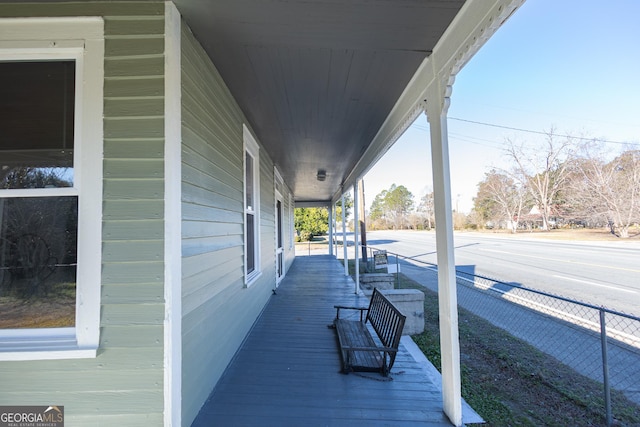 wooden deck featuring covered porch