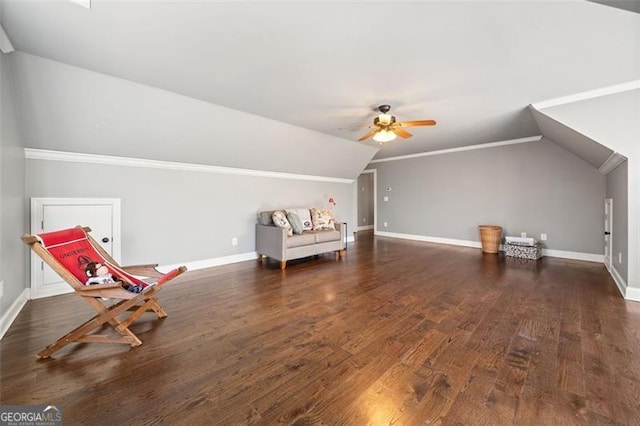 bonus room with ceiling fan, dark hardwood / wood-style flooring, and vaulted ceiling