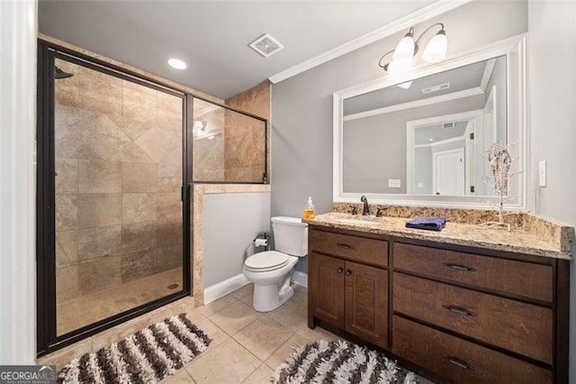 bathroom featuring tile patterned flooring, a shower with shower door, toilet, vanity, and crown molding