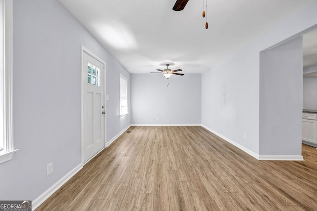 interior space featuring ceiling fan and light hardwood / wood-style floors