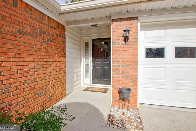 property entrance featuring a garage