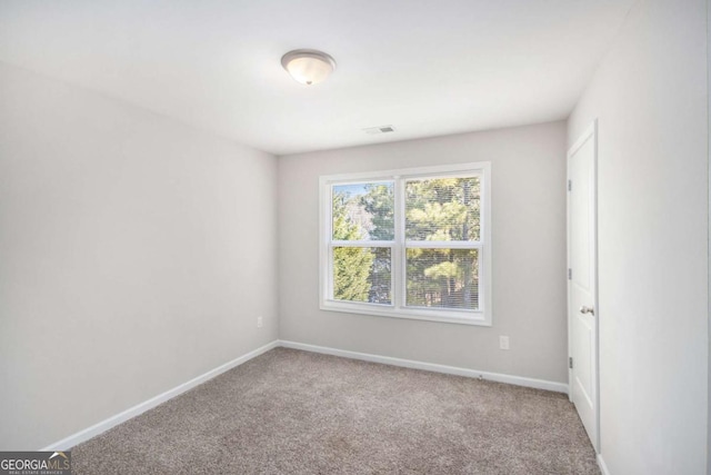 view of carpeted spare room