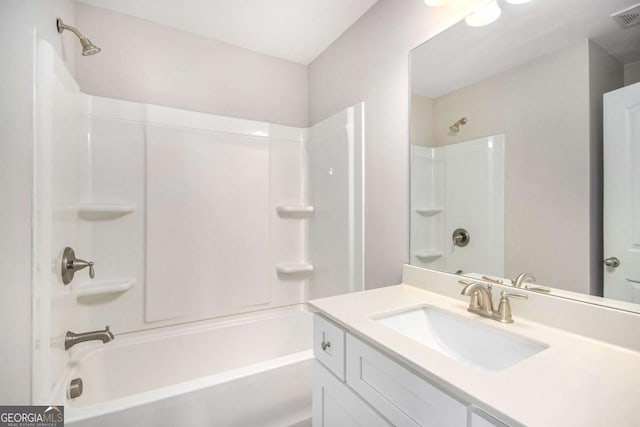 bathroom with vanity and shower / bath combination