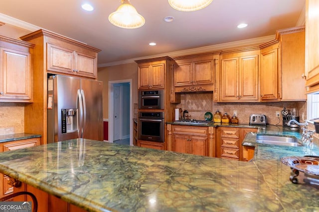 kitchen with stainless steel appliances, ornamental molding, tasteful backsplash, and pendant lighting