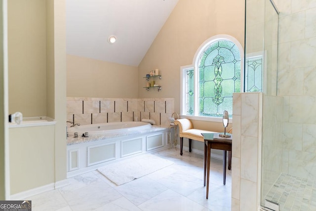 bathroom with shower with separate bathtub, high vaulted ceiling, and a healthy amount of sunlight